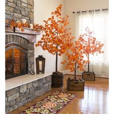 a living room filled with furniture and a fire place in front of a stone fireplace