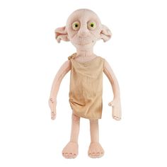 an alien doll with green eyes standing on a white background