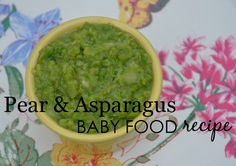 pea and asparagus baby food recipe in a yellow bowl on a floral tablecloth