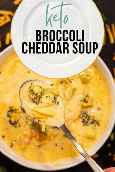 broccoli cheddar soup in a white bowl with a spoon