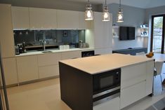 the kitchen is clean and ready for us to use in its new owner's home