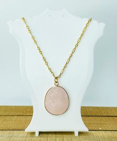 This 16K Gold Filled Rose Quartz Crystal Pendant Necklace will help you shine everyday through life's daily struggles while wearing it with the flaming sun pendant, that will bring out your vibrant confidence. This necklace is made with a gold finished flaming sun pendant and put together on 16K gold filled chain. After all, you deserve a 16K Gold Filled Rose Quartz Crystal Pendant Necklace that will encourage you to bring out your confidence self-worth, while expressing your unique & one-of-a-k Gold Rose Quartz Round Pendant Jewelry, Gold Rose Quartz Round Pendant Necklace, Moon Phases Necklace, Sun Pendant, Quartz Crystal Pendant, Crystal Pendant Necklace, Matching Jewelry, Creating Jewelry, Self Worth