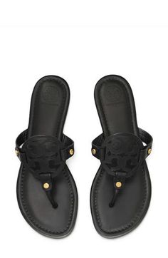 Known for its supple leather, iconic branding and lightly cushioned footbed, the original Miller sandal is a timeless favorite. Cushioned footbed Leather upper and lining/rubber sole Imported Birkenstock Cannes, Lowmel Sneaker, Tory Burch Miller Sandals Black, Ugg Lowmel, Jadon Platform Boots, Vagabond Shoemakers, Tory Burch Flip Flops, Miller Sandal, Tory Burch Sandals