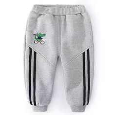 * Number Of Pieces:1 Pieces * Material:Cotton * Thickness:Fleece-lined * Season:Autumn * Wash Label:On the inside Best Sales Dinosaur Pattern Sports Pants for Toddler Boy Wholesale Children's Clothing ,which is very comfortable to wear it.Fashionable high quality organic and affordable clothes Dinosaur Pattern Sports Pants for Toddler Boy Wholesale Children's Clothing that will always catch the attention of people. Dinosaur Pattern Sports Pants for Toddler Boy Wholesale Children's Clothing are v Gray Sportswear Pants For Winter, Winter Sports Cotton Pants, Winter Jogging Bottoms In Gray, Gray Fleece Winter Bottoms, Gray Sportswear Bottoms For Winter, Winter Sportswear Cotton Pants, Winter Sports Fleece Bottoms, Winter Cotton Sportswear Bottoms, Gray Sporty Bottoms For Winter