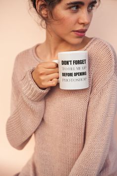 a woman holding a coffee mug with the words don't forget to tell me before opening photography