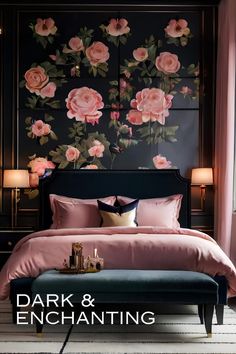 a bed with pink flowers on the wall above it and a bench in front of it