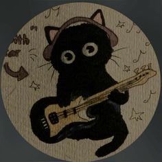 a black cat with a hat holding a guitar