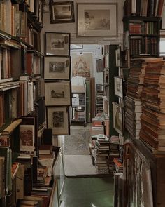 a narrow room filled with lots of books