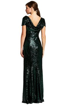 Make an entrance in this stunning floor-length sequin number from HotSquash London! This one-of-a-kind fully sequined gown drapes to the ground, skimming over your curves and kicking out from the knees giving the dress an elegant fishtail silhouette. The dress is half-lined, adding to the sexiness of the style, with a low cowl back, further adding to the allure. Make an entrance in this stunning floor-length sequin number from HotSquash London! Mermaid style silhouette Low, cowl-style back Desig London Clothing, Fishtail Maxi Dress, London Outfit, Fishtail Skirt, Sequin Maxi Dress, Sequin Maxi, Sequin Gown, Dark Wear, Maxi Dress Green