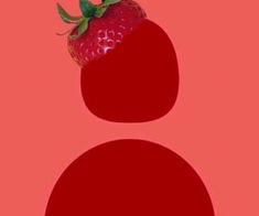 a strawberry sitting on top of a red object