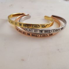 Don't Let The Hard Days Win Bracelet - Inspirational Personalized Engraved Bracelets -Friendship Bracelet This Bracelet has the Message engraved on the Outside.  Quality & Size  size: 6mm x 16 cm long well curved and can be Flexible enough with a gentle squeeze or slight pull to fit on all wrist sizes. Material: Made from hypo-allergenic surgical grade 316L stainless steel for long life, nickel free, 100% healthy and environmental-friendly! It is durable and strong, thick but also LIGHTWEIGHT. W Motivational Jewelry, Bracelets Friendship, Bracelets Adjustable, Bracelet Quotes, Inspirational Bracelets, Hard Days, Motivational Gifts, Engraved Bracelet, Smooth Edges