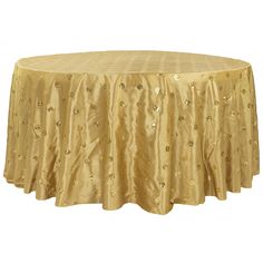 a round table with gold sequins on it