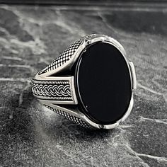 Mens Silver Oval Black Onyx Gemstone Ring , Big Onyx Stone Mens Ring , Geometric Engraved Ring , 925K Sterling Silver Ring , Gift For Him , Same Day For Shipping ✧ Product Details * Handmade İtem * Gender : Male / Female * Material : 925K Sterling Silver * Ring Weight : 10.5 Grams * Gemstone Type : Black Onyx ✔ Usage Details * Silver jewelry is very sensitive to chemicals. It is recommended to keep away from chemical substances such as cream, bleach, deodorant, detergent. * Silver jewelry can al Onix Ring Man, Luxury Large Stone Rings For Men, Luxury Men's Onyx Ring As A Gift, Luxury Onyx Men's Ring As A Gift, Luxury Silver Onyx Men's Ring, Mens Gold Jewelry, Onyx Stone, Silver Man, Ring Collections