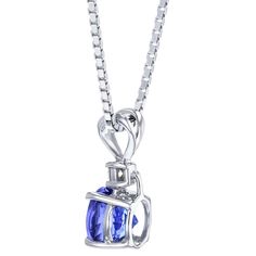 A multidimensional experience Add a sedated elegance to any ensemble with this unrestrained beauty. This classic pendant features round shape Peora natural Tanzanite gemstones in 14K white gold. Our natural Tanzanite gemstones are a unique gift from nature. By cutting them in a way that respects the rough's natural radiance, we ignite their inherent intensity and maximize their brilliance to deliver on our signature Peora standard. Handcrafted in pure 14K white gold goodness, this pendant has be Tanzanite Pendant, Blue Topaz Bracelet, Pendant Diamond, Tanzanite Diamond, Amber Ring, Tanzanite Gemstone, Natural Tanzanite, Round Stud Earrings, Pretty Earrings