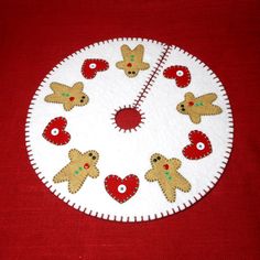 a white and red cloth with teddy bears on it