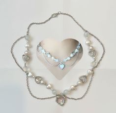 A handmade necklace inspired off the sky~! Cute White Necklace With Heart Charm, Cute White Heart Pendant Jewelry, White Heart Necklaces For Jewelry Making, White Heart Shaped Necklaces For Jewelry Making, Cute White Necklace With Heart Beads, White Double Heart Clavicle Chain Necklace, Handmade White Heart Necklace, White Heart Pendant Necklace For Jewelry Making, White Heart Beaded Pendant Necklace