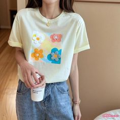 Qteee - Elegance Stitched Round Neck Loose T-Shirt with Floral Embroidery Casual Yellow Tops With Embroidered Graphics, Summer Floral Embroidered Crew Neck T-shirt, Summer Crew Neck T-shirt With Floral Embroidery, Casual Yellow T-shirt With Embroidered Graphics, White Short Sleeve Top With Floral Applique, White Floral Applique Short Sleeve Top, Yellow Crew Neck Top With Floral Embroidery, Yellow Cotton Top With Embroidered Graphics, Yellow Embroidered Short Sleeve T-shirt