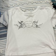 Pac Sun Soft Angels Shirt (Never Worn) Got Wrong Size Too Small White Logo Print Crop Top, Spring Crop Top With Logo Print, White Printed Crop Top, Angel Shirt, Pacsun Tops, Nike Tennis Dress, Low Rise Jeans, Tennis Dress, Mini Boden