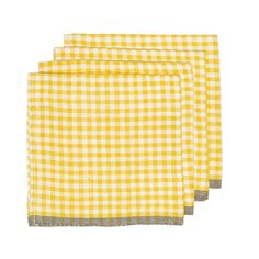 three yellow and white checkered napkins