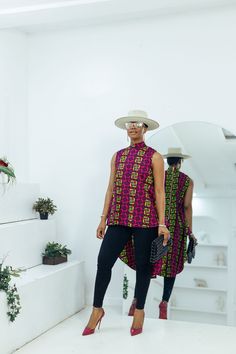 Experience sophistication and exclusivity with the TRACY AFRICAN PRINT HILOW TOP, a must-have for your wardrobe. Created with intricate African print fabric, this top exudes elegance and luxury. The distinctive hi-low design adds a touch of flair to elevate your summer style. Don't miss out on this premium piece! FEATURES.* 100% African Wax Cotton* Back Zipper with hi low style * Top is UnLined * Model Is Wearing A Size S/MCARE INSTRUCTION* Hand Wash in Cold Water.* Do Not Bleach.* Press with Co Ankara Kimono Style, African Print Peplum Top, Tops With Jeans, African Print Kimono, Printed Kimono Jacket, African Tops, Peplum Styles, Africa Fashion, African Print Fabric