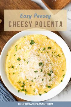 a white bowl filled with cheese and parmesan