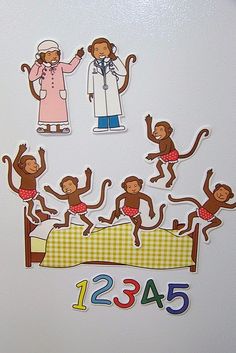 stickers depicting monkeys in bed with doctor and nurse on the wall behind them that says 1234