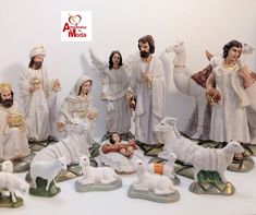 a group of figurines depicting the birth of jesus