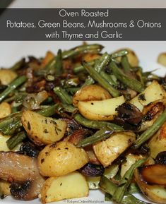 potatoes, green beans, mushrooms and onions with thyme and garlic on a white plate