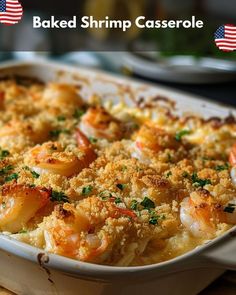 baked shrimp casserole with parmesan bread crumbs in a white dish