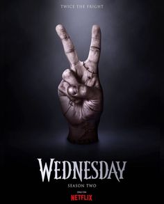 the poster for wednesday season two, which features an image of a hand making the peace sign