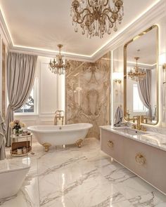 an elegant bathroom with chandelier, tub and marble countertop in the middle