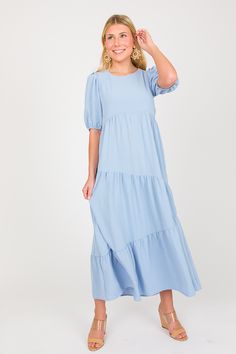 Slanted Tiers Midi, Blue - New Arrivals - The Blue Door Boutique Flowy Tiered Maxi Dress With Gathered Sleeves, Flowy Maxi Dress With Gathered Short Sleeves, Solid Color Tiered Dress With Ruffle Hem, Flowy Short Sleeve Puff Dress With Ruffle Hem, Flowy Puff Sleeve Dress With Ruffle Hem, Brunch Puff Sleeve Dress With Ruffle Hem, Puff Sleeve Dress With Ruffle Hem For Brunch, Modest Short Sleeve Maxi Dress With Ruffles, Solid Tiered Maxi Dress With Ruffle Hem