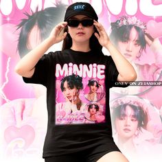 "Gidle Minnie Bootleg Shirt: Exclusive K-pop Fan Apparel - Gidle Shirt - Kpop T-shirt - Kpop Merch - Kpop Gift - Gidle Retro 90s Shirt This is our unisex shirt, and it's true to size. To get the oversized look, you have to choose +1 or +2 of your original size number. If you're not sure about your size, you can refer to our size chart. Reach out if you have any issues with your order! The unisex heavy cotton tee is the basic staple of any wardrobe. It is the foundation upon which casual fashion grows. The specially spun fibers provide a smooth surface for premium printing vividity and sharpness. No side seams mean there are no itchy interruptions under the arms. The shoulders have tape for improved durability. .: 100% cotton (fiber content may vary for different colors) .: Medium fabric (5 Cute Graphic Design T-shirt For Streetwear, Trendy Anime Print T-shirt For Streetwear, Spring Y2k Style T-shirt With Character Print, Pink Kpop T-shirt For Summer, Kpop Style Graphic Print T-shirt For Spring, Cute Fan Merchandise T-shirt For Summer, Spring Kpop T-shirt With Graphic Print, Spring Kpop Style T-shirt With Graphic Print, Cute Graphic T-shirt For Streetwear