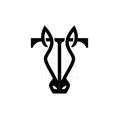 an animal's head is shown in the shape of a letter t, with two horns