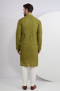 Green kurta with thread embroidered floral geometric motifs, embellished by sequins. Comes with a pant. - Aza Fashions Long Sleeve Sequin Kurta For Designer Wear, Designer Long Sleeve Kurta With Mirror Work, Festive Cotton Kurta With Sequins, Designer Kurta With Mirror Work For Festive Occasions, Designer Festive Kurta With Mirror Work, Fitted Sequined Kurta For Diwali, Festive Green Sequined Kurta, Designer Sequined Kurta For Festive Occasions, Fitted Long Sleeve Kurta With Mirror Work