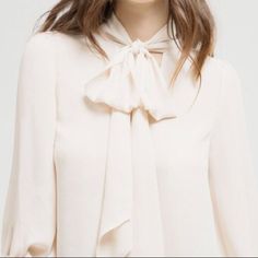 A Sophisticated, Ladylike Dramatic Bow Detail Infuses Our Sheer Split-Neck Blouse With Feminine Flair. Blouse Sale, Cell Phone Holster, Phone Holster, Bow Blouse, Boutique Tops, Walker Boots, Pajama Shirt, Fit N Flare Dress, Rain And Snow Boots