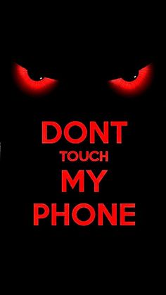 the words don't touch my phone are lit up in front of red eyes