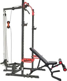 the home gym is equipped with an adjustable bench and pull up bar