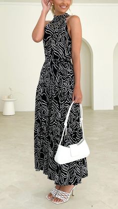 Flirty and floral, this maxi dress is the perfect piece to flaunt as we head into Summer with its stunning high neck design. Casual Black Halter Maxi Dress, Casual Black Maxi Halter Dress, Black Casual Halter Maxi Dress, Summer Halter Neck Pre-draped Maxi Dress, High Neck Designs, Reindeer Headband, Swimwear Cover, Daily Dress, Dress Jewelry