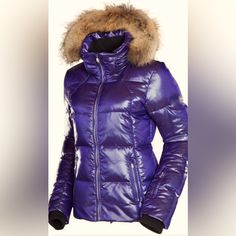 This Gently Loved Rossignol 1907 Bb Down Ski Jacket Is High- Performance On The Slopes, And High-Fashion Off. The Fabric Has A Serious Sheen, And When You Look Closely You'll See A Mini Chevron Pattern. The Bb Jacket Is Exceptionally Warm; It's Insulated With Top-Quality Down. Down Is Lightweight So You'll Feel Incredibly Warm Without The Annoyance Of A Heavy Coat. Dwr Provides Water-Resistant Protection. The Bb Jacket Is Topped Off With A Silky Real Fur Hood Trim. Specs: * Fabric Rating: Water-Resistant * Shell Material: 100% Polyamide Shell Fabric * Lining Material: 100% Polyester Lining * Insulation: 550-Fill Pyrenean Down (90% Down/10% Feathers) * Len Luxury Fitted Purple Outerwear, Heavy Coat, Shiny Fabric, Fur Hood, Real Fur, Chevron Pattern, Ski Jacket, Utility Jacket, Warm Colors