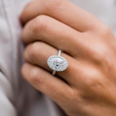 a close up of a person wearing a ring