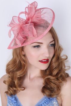 Timeless glamour. This sassy fascinator gives a nod to vintage style with a bouncy mesh ribbon and flighty feathers. With its classic sinamay mesh shape and elegant look it will be your go-to fascinator for the season. - Light weight - Attached to headband for easy wear - Comes in 18 bold colors Hat Pictures, Tea Hats, Hexagon Sunglasses, Blonde Bob Wig, Pink Fascinator, Timeless Glamour, Hat Fascinator, Fascinator Hairstyles, Dance Hairstyles