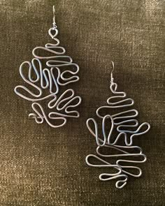 handmade aluminum earrings, each slightly varies in style and shape. Funky Earrings Handmade, Wire Art Earrings, Handmade Wire Earrings, Beaded Earrings Tutorial, Wired Earrings, Wire Shapes, Wire Earrings Handmade, Diy Wire Earrings