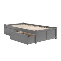 an image of a bed with two drawers in it's bottom section and the bottom drawer open