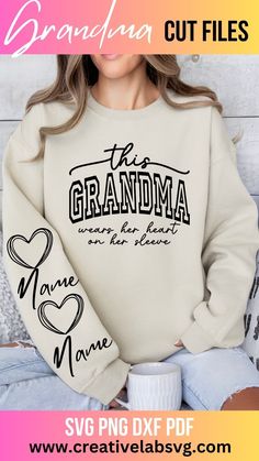 a woman wearing a grandma sweatshirt with her name on it and the words grandma written in black