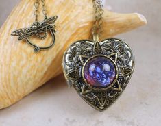 Dragon's Breath Red Glass Opal Music Locket #musicbox #photolocket #photo #giftsforanyoccasion Music Locket, Music Box Locket, Red Dragons, Locket Jewelry, Dragons Breath, Round Locket, Heart Locket Necklace, Davy Jones, Photo Locket