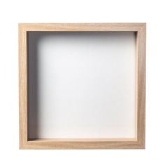 an empty wooden frame with white paper in the bottom and bottom corner, on a white background