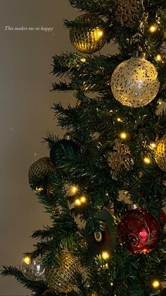 a decorated christmas tree with lights and ornaments