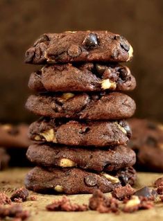 a stack of chocolate cookies sitting on top of each other