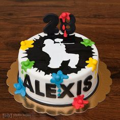 a birthday cake decorated with flowers and the number twenty two is for alex's